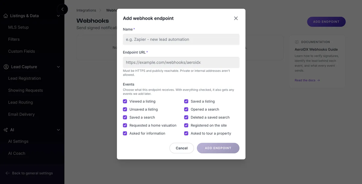 The Webhooks page under Integrations in AeroIDX with the Add webhook endpoint dialog open. The dialog has a Name field with the example e.g. Zapier - new lead automation, and an Endpoint URL field with the note Must be HTTPS and publicly reachable, private or internal addresses aren't allowed. Under Events, with the note that with everything checked the endpoint also gets any events added later, ten checked boxes read Viewed a listing, Saved a listing, Unsaved a listing, Opened a search, Saved a search, Deleted a saved search, Requested a home valuation, Registered on the site, Asked for information and Asked to tour a property, above Cancel and Add endpoint buttons. Behind the dialog, a Documentation card links to the AeroIDX Webhooks Guide